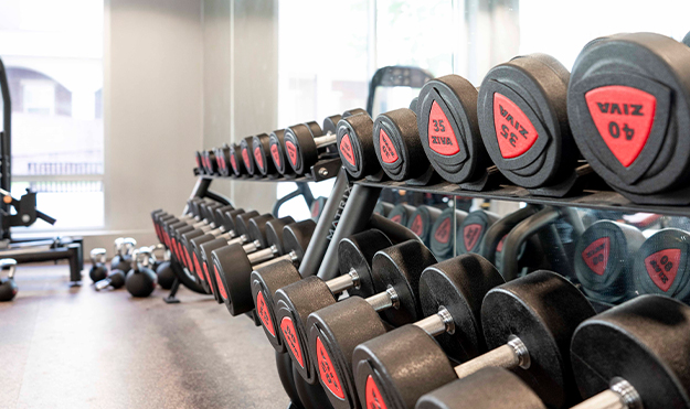 Fitness center with weights and cardio equipment