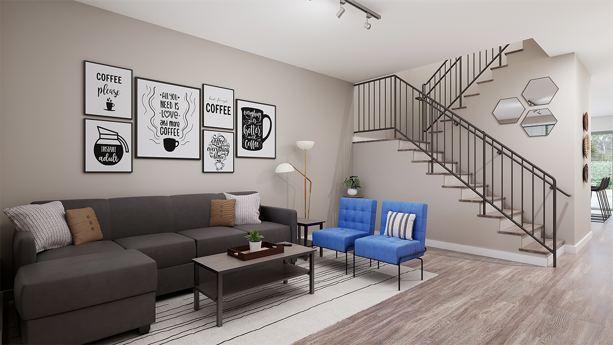 Furnished living space with stairs leading up to the next floor