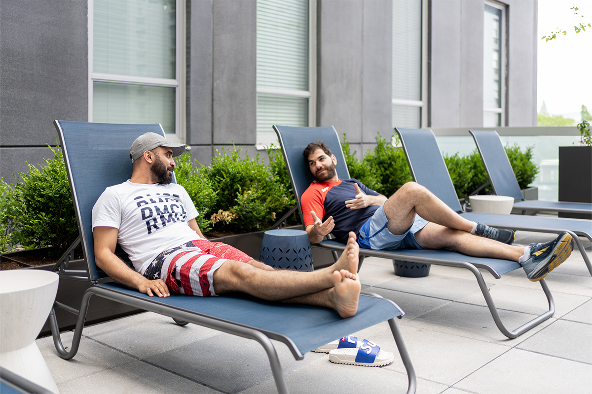Young residents relaxing on the sun deck