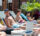residents lounging by the pool