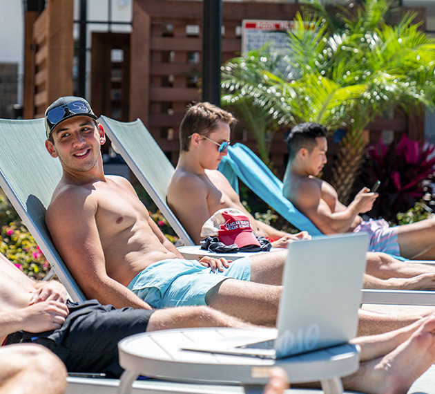 residents lounging by the pool