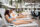 young adults lounging by the pool
