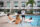 A group of people enjoying in a pool
