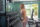 A woman doing arm exercises in a gym