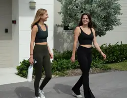two young women in sporting active wear